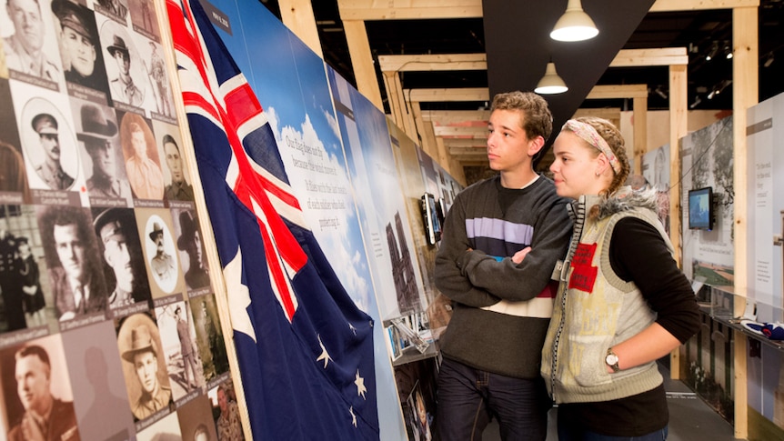 A stylised trench shows photos and screens sharing the experience of Queensland students who went to Anzac Cove.