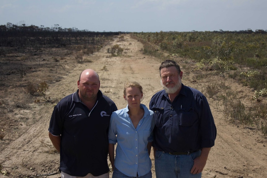 SEPWA President Greg Curnow, SEPWA Secretary Tara Vermeersch and Grass Patch farmer Dan Sanderson at a firebreak west of town.