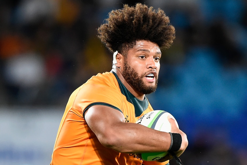 A Wallabies player holds the ball during a Test match in 2021.