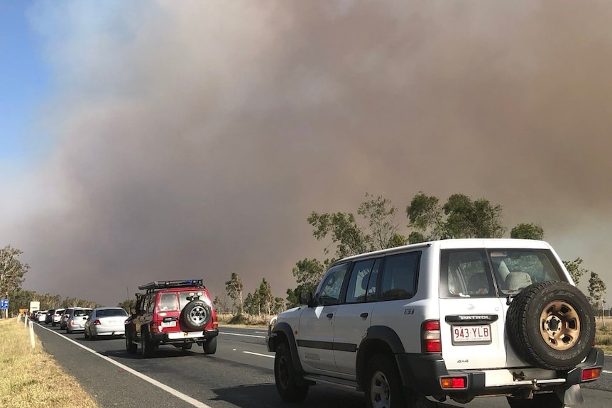 Cars lined up on a road outside Rockhampton