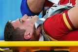 Wales centre Scott Williams leaves on a stretcher