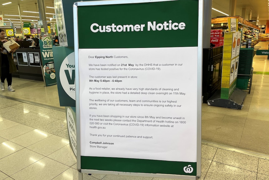 A sign at a Woolworths telling people the store was an exposure site for contact tracing purposes.