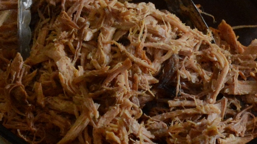 Pulled pork with paw paw salad, served on a fresh bun. Prepared by Deb McLucas at Freckle Farm.