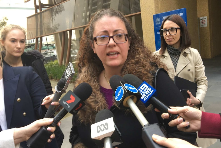 Eleni Kontogiorgis speaks to media outside the Coroners Court of Victoria.