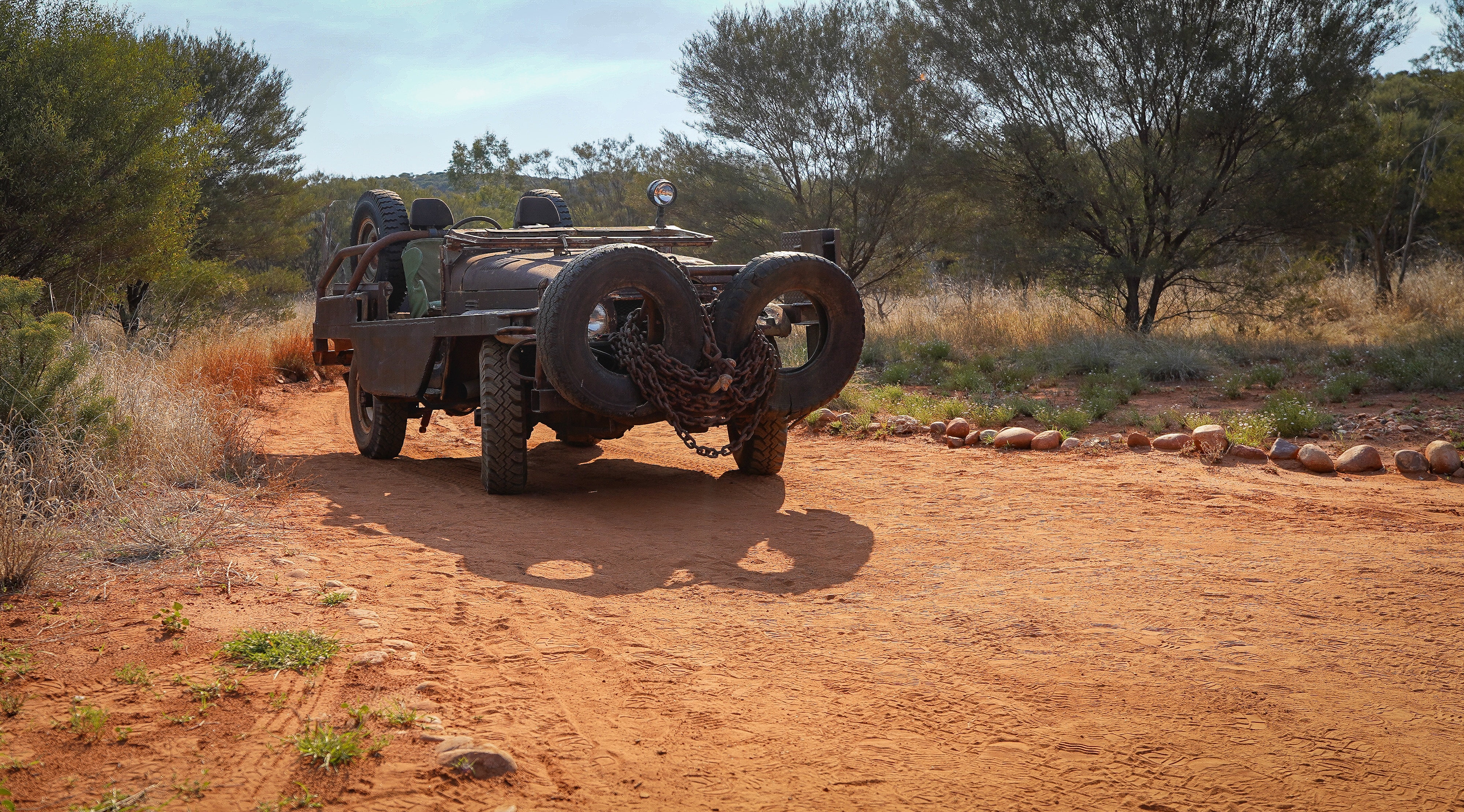 Warwick Thornton's bull catcher sits empty on a dusty dirt road.