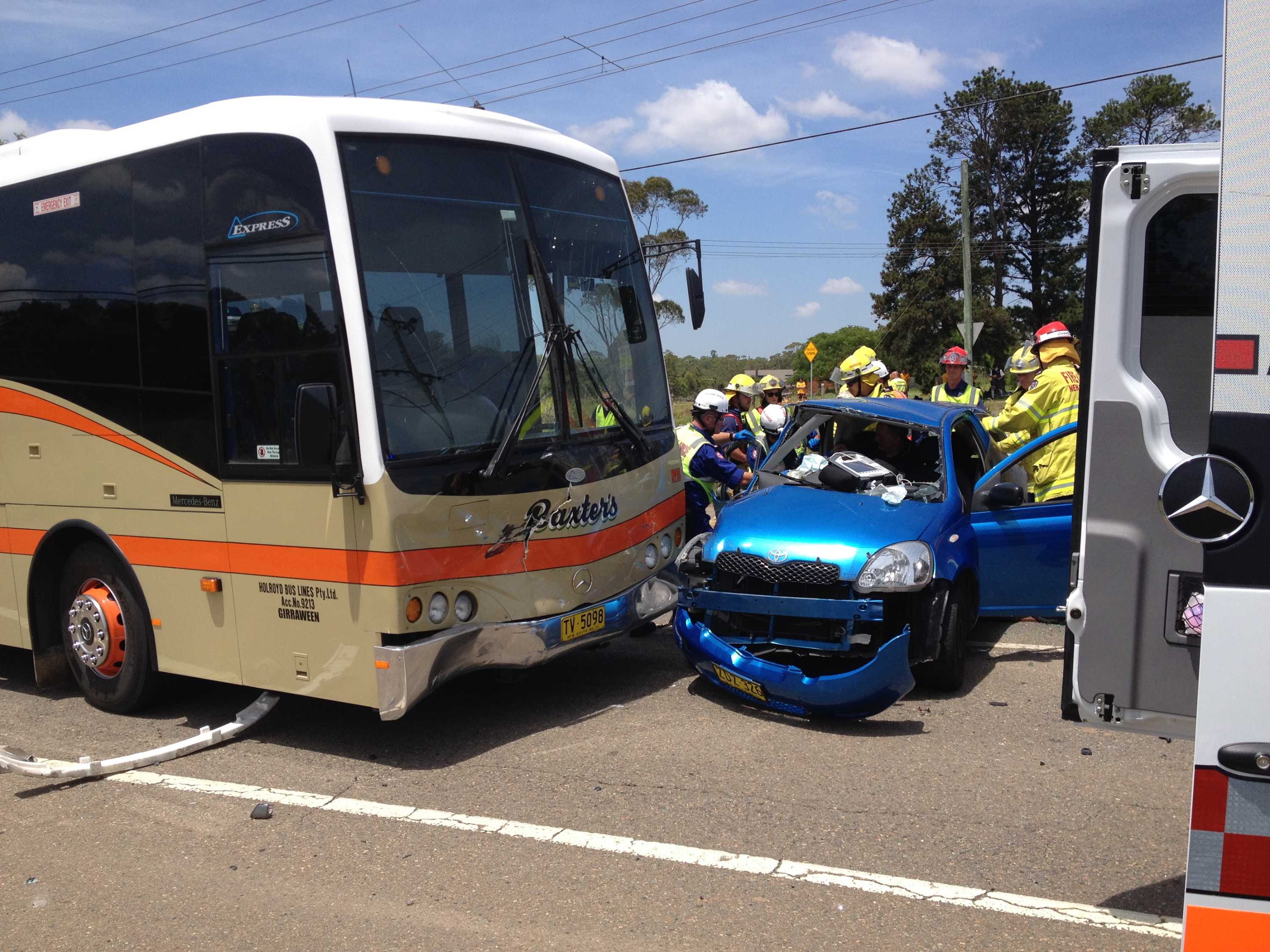 School bus and car collide in Sydney's north-west; teenage driver in ...