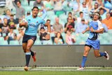 Hat-trick hero ... Israel Folau crosses to score his opening try