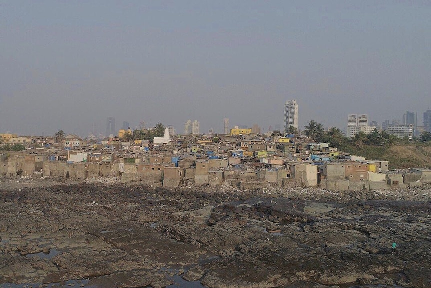 A Mumbai slum before it was painted.