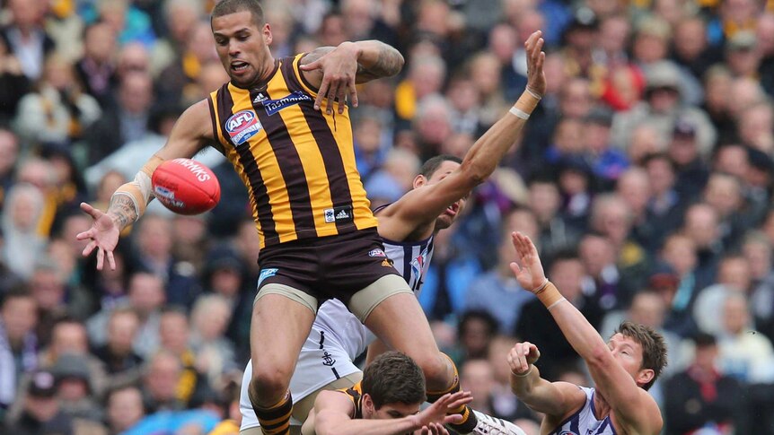 The Hawks' Lance Franklin leaps for a mark during the 2013 grand final against Fremantle.