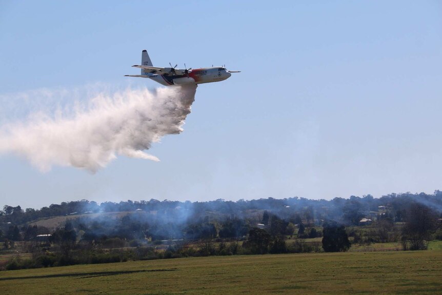 The C-130 Hercules called Thor dumps water on the Richmond RAAF Base.