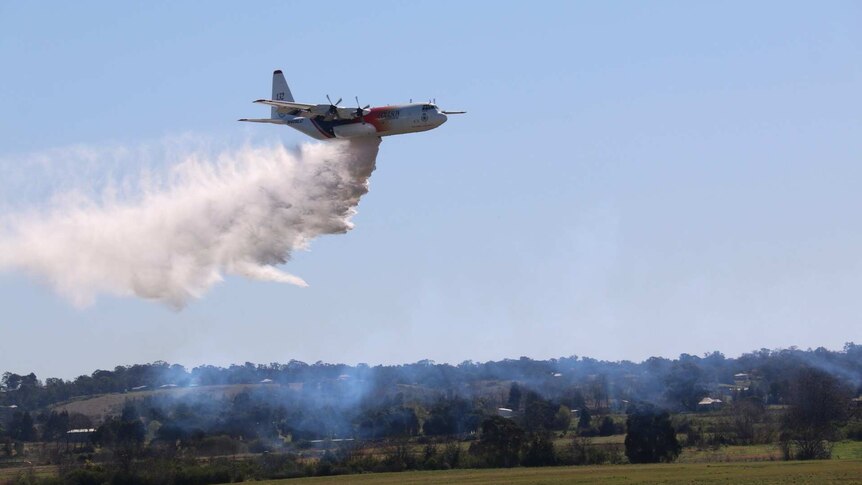 The C-130 Hercules called Thor dumps water on the Richmond RAAF Base.