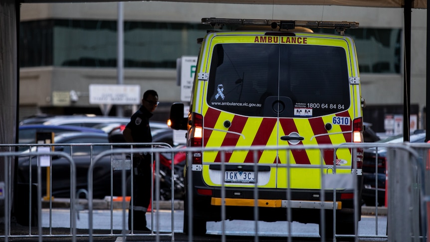 A ambulance is parked at the Alfred Hospital.