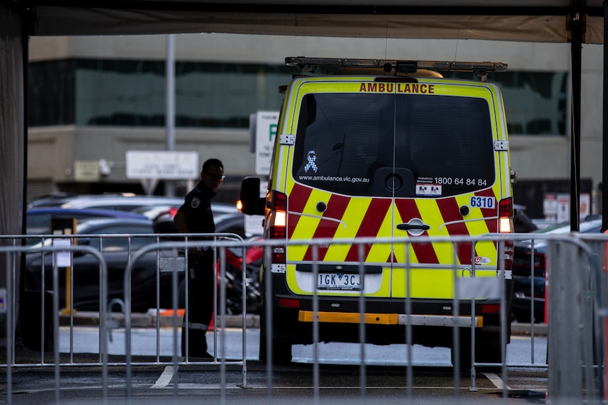 A ambulance is parked at the Alfred Hospital.