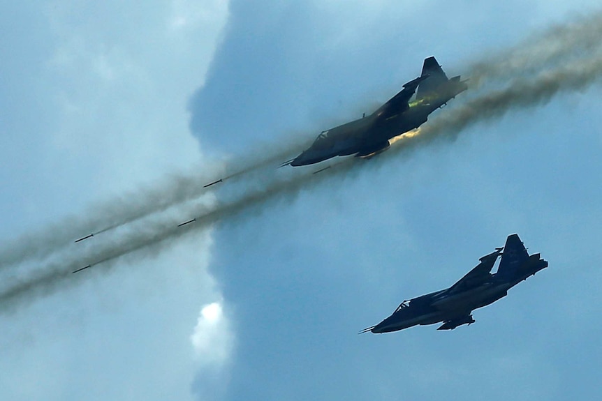 Sukhoi Su-25 jet fighters perform during the International Army Games 2016