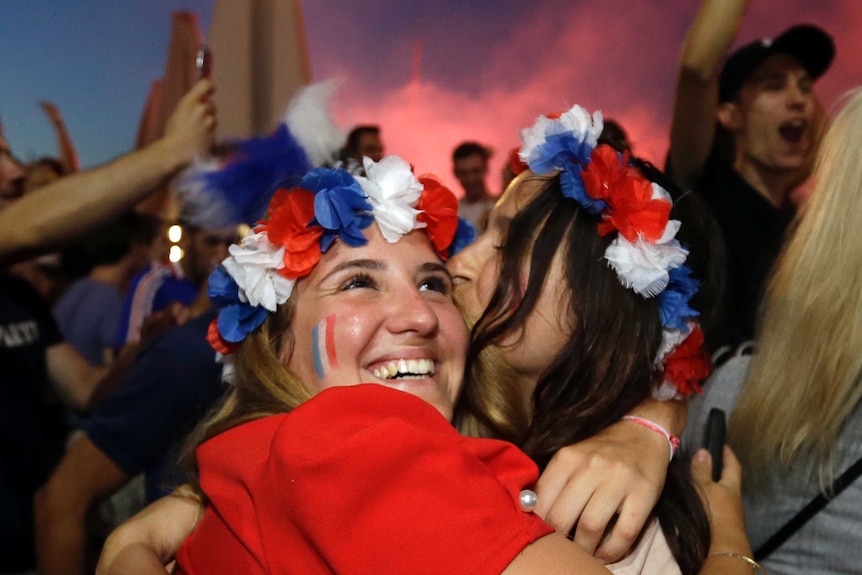 French fans celebrate France win over Belgium