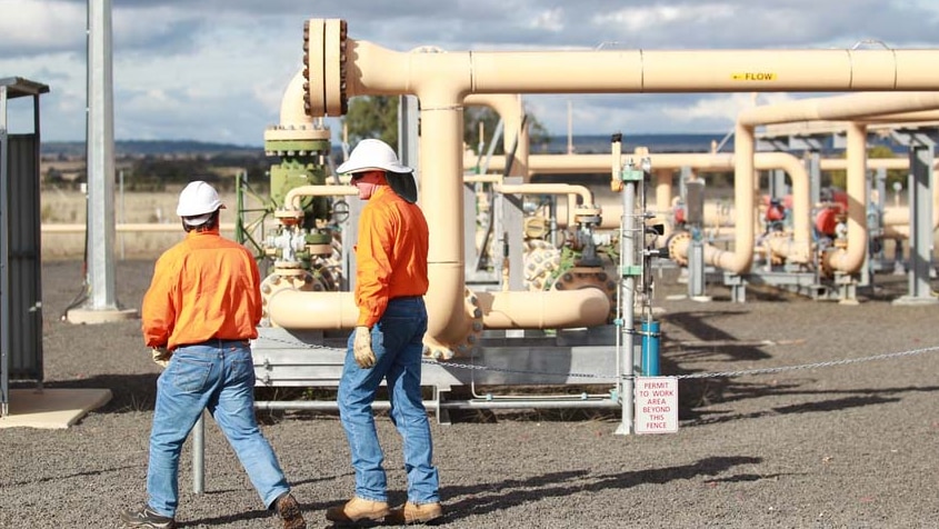 Workers at a coal-seam gas facility at Spring Gully in southern Queensland.