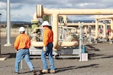 Workers at a coal-seam gas facility at Spring Gully in southern Queensland.