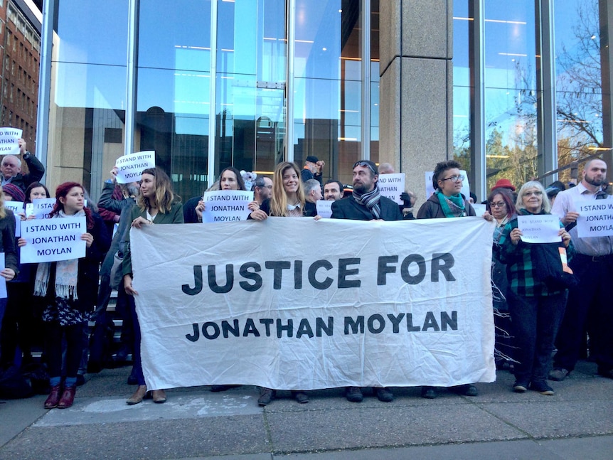 Jonathan Moylan's supporters appeal for leniency outside the Supreme Court in Sydney.