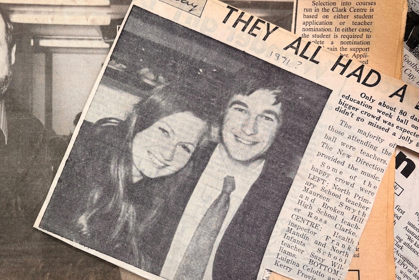 Two newspaper pages overlapping showing black and white photos of a man and a woman