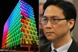 A headshot of a man in a suit and glasses next to a building lit up in rainbow colours.