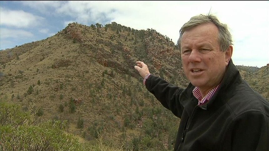 Then-premier Mike Rann visited remote Arkaroola to announce there would be a ban on mining
