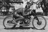 Motorcyclist Jack Ehret with his Vincent Black Lightning in a simulation of a racing seating position in 1952.