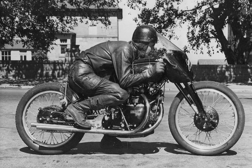 Motorcyclist Jack Ehret with his Vincent Black Lightning in a simulation of a racing seating position in 1952.