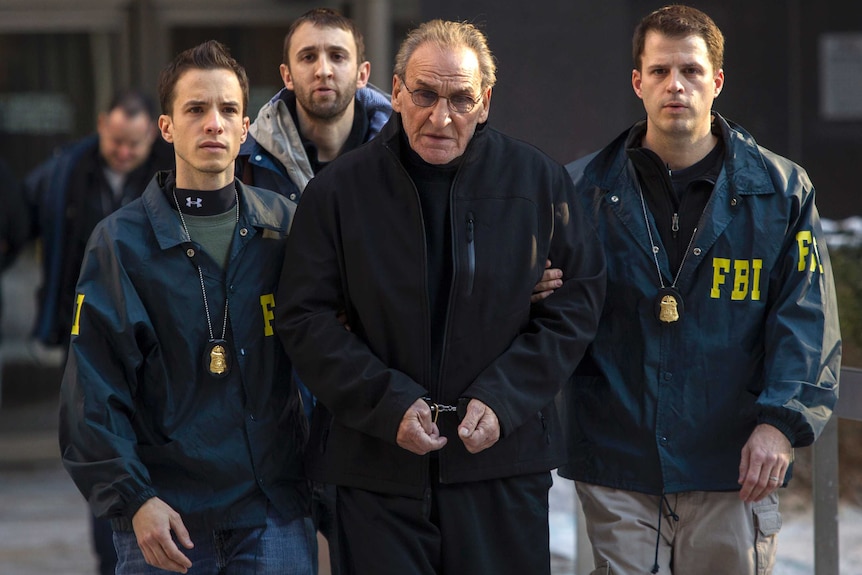 Bonanno crime family leader Vincent Asaro is escorted by FBI agents from their Manhattan offices in NY.