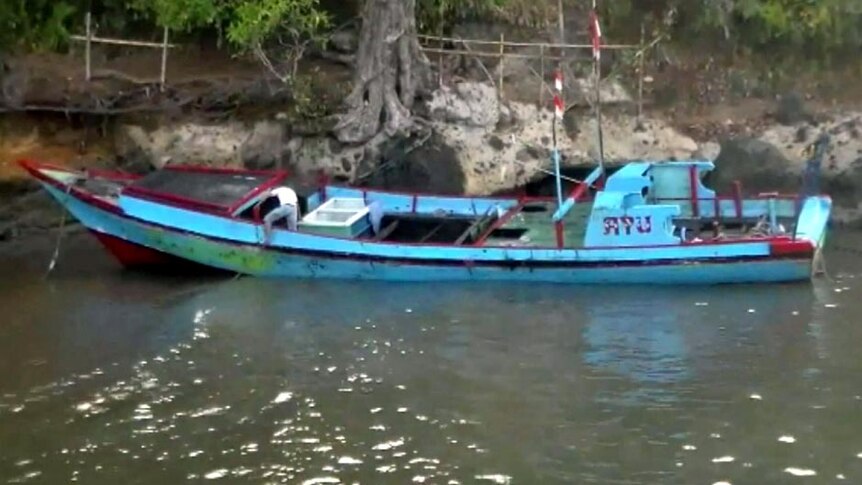 A wooden boat that carried 18 asylum seekers and three crew, in Cidaun in west Java.