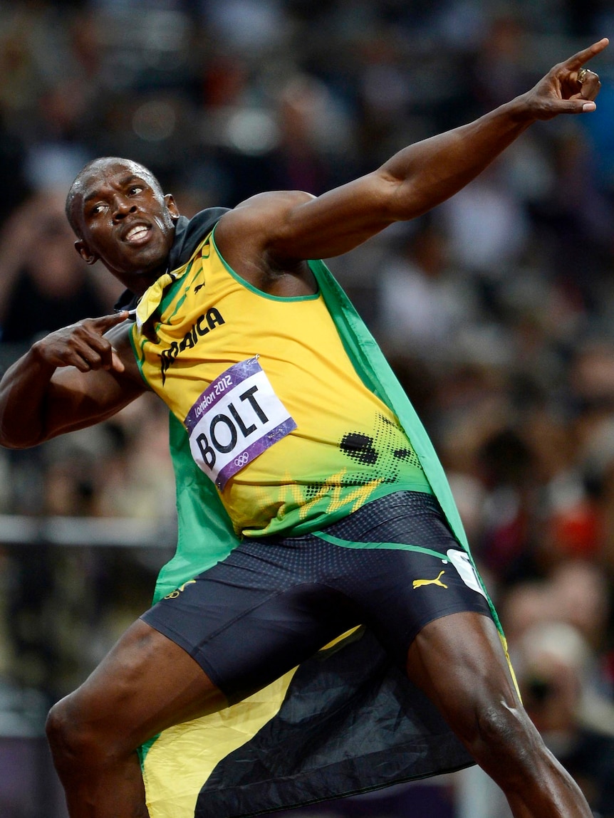 Jamaica's Usain Bolt does his lightning bolt pose after winning the men's 100m final.