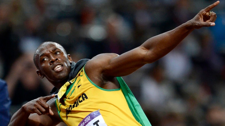 Jamaica's Usain Bolt does his lightning bolt pose after winning the men's 100m final.