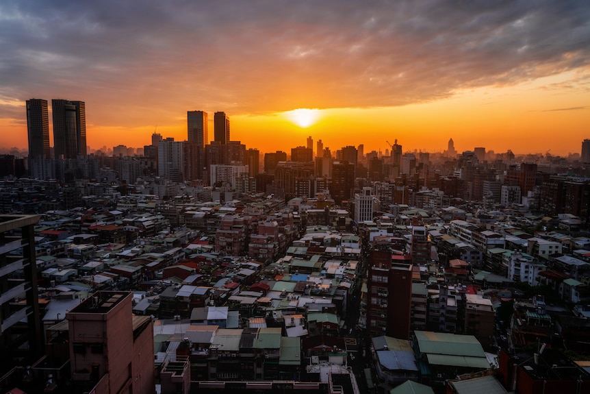 The skyline of Taiwan's capital Taipei shot as the sun sets 