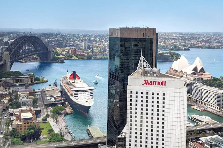 a sky view of sydney harbour with marriott hotel in the centre