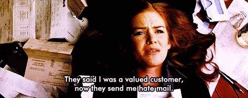 Actress Isla Fisher is surrounded by bills, "They said I was a valued customer, now they send me hate mail," she says.