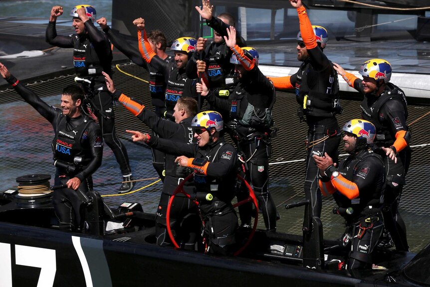 Oracle Team USA celebrates after winning the final America's Cup race.