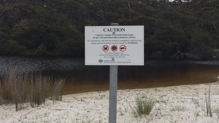 A sign warning people not to eat seafood caught in local waterways