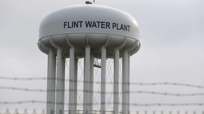 A view of the tall white Flint water plant tower.