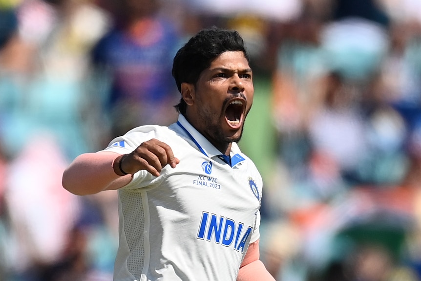 Umesh Yadav celebrates