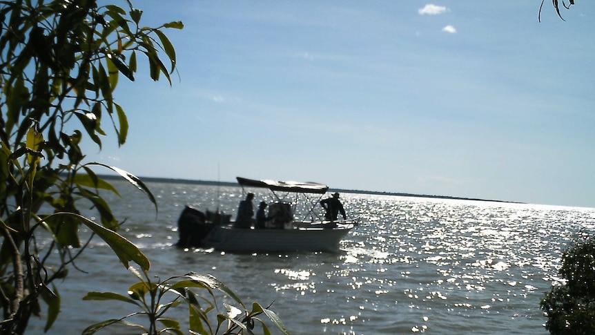 two mud crab pots at low tide