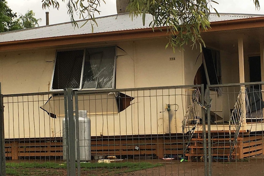 Windows and fibro walls blown out in a house