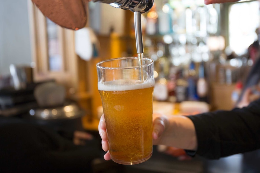 A beer being poured.