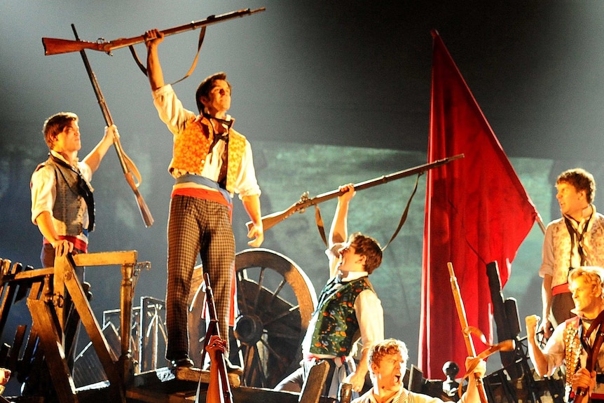 The cast of the musical Les Miserables perform at Her Majesty's Theatre in Melbourne.