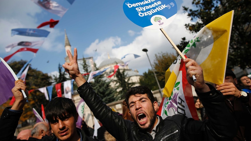 Supporters of the pro-Kurdish Peoples' Democratic Party (HDP) chant slogans during an attempted march in Istanbul.