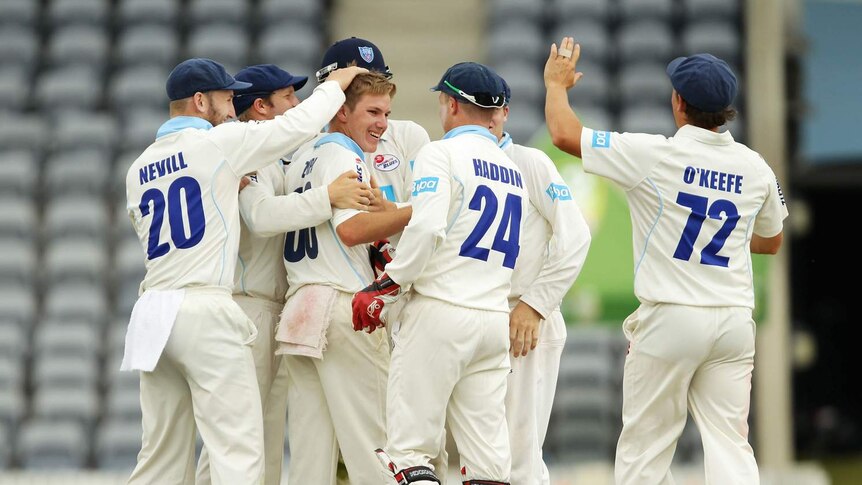 Debutant Blues' leg-spinner Adam Zampa celebrates after dismissing the Bulls' Chris Hartley.