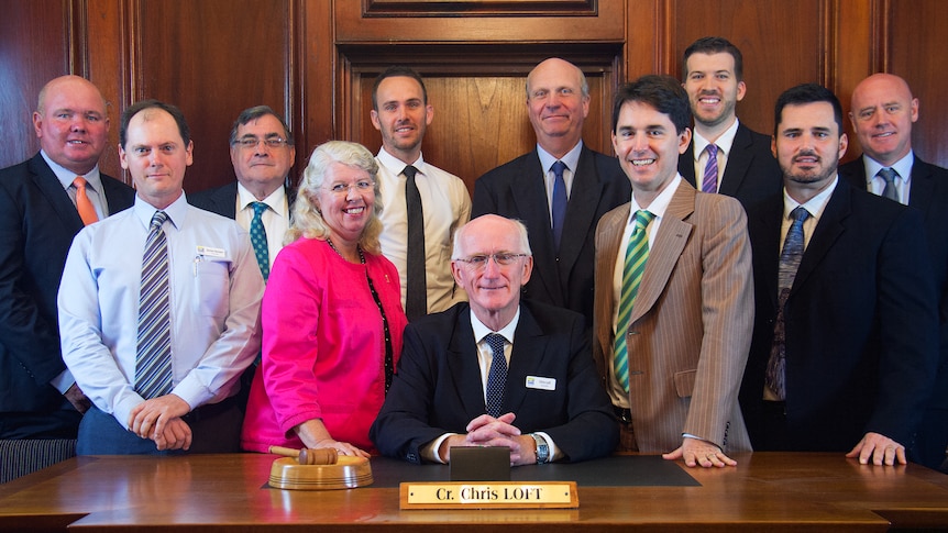 11 Fraser Coast Councillors posing for a group photo in council chambers.