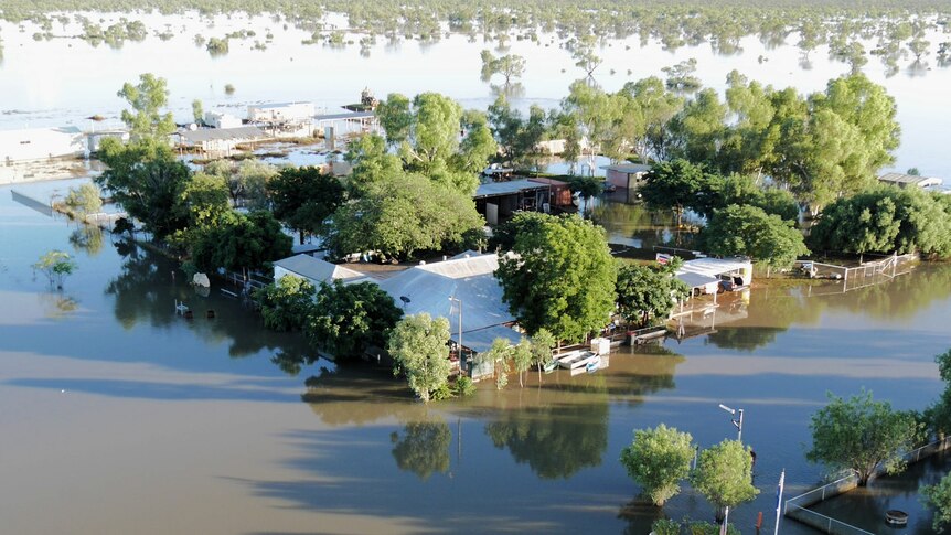 An aerial view of a flooded outback town.
