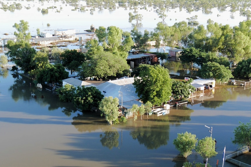 An aerial view of a flooded outback town 
