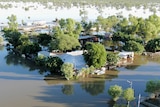An aerial view of a flooded outback town 