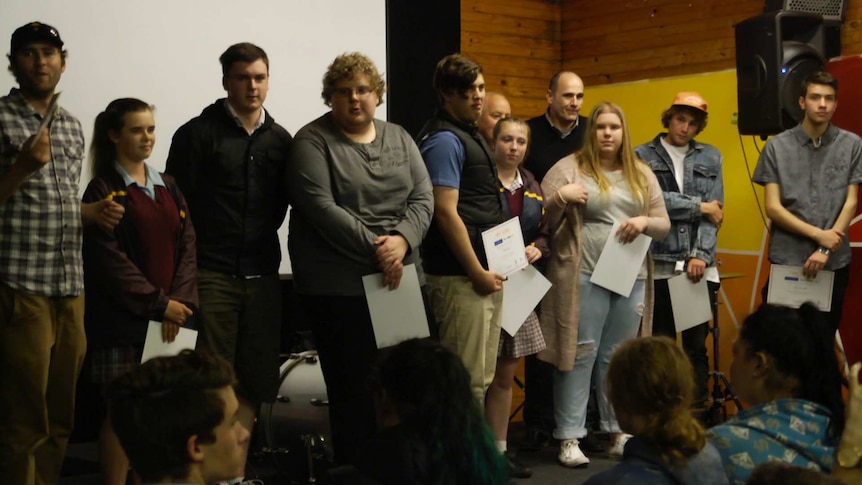 Group of young people in hall