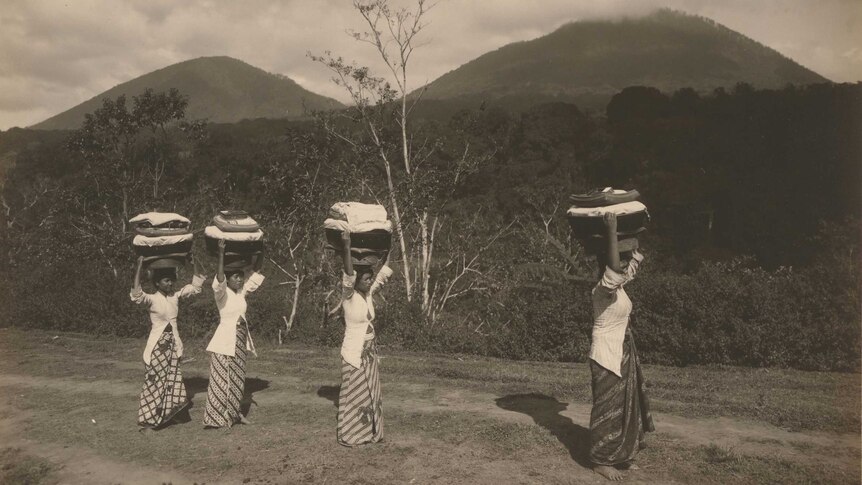 Gelatin silver photo. Women on road to Buleleng, Bali c.1928.